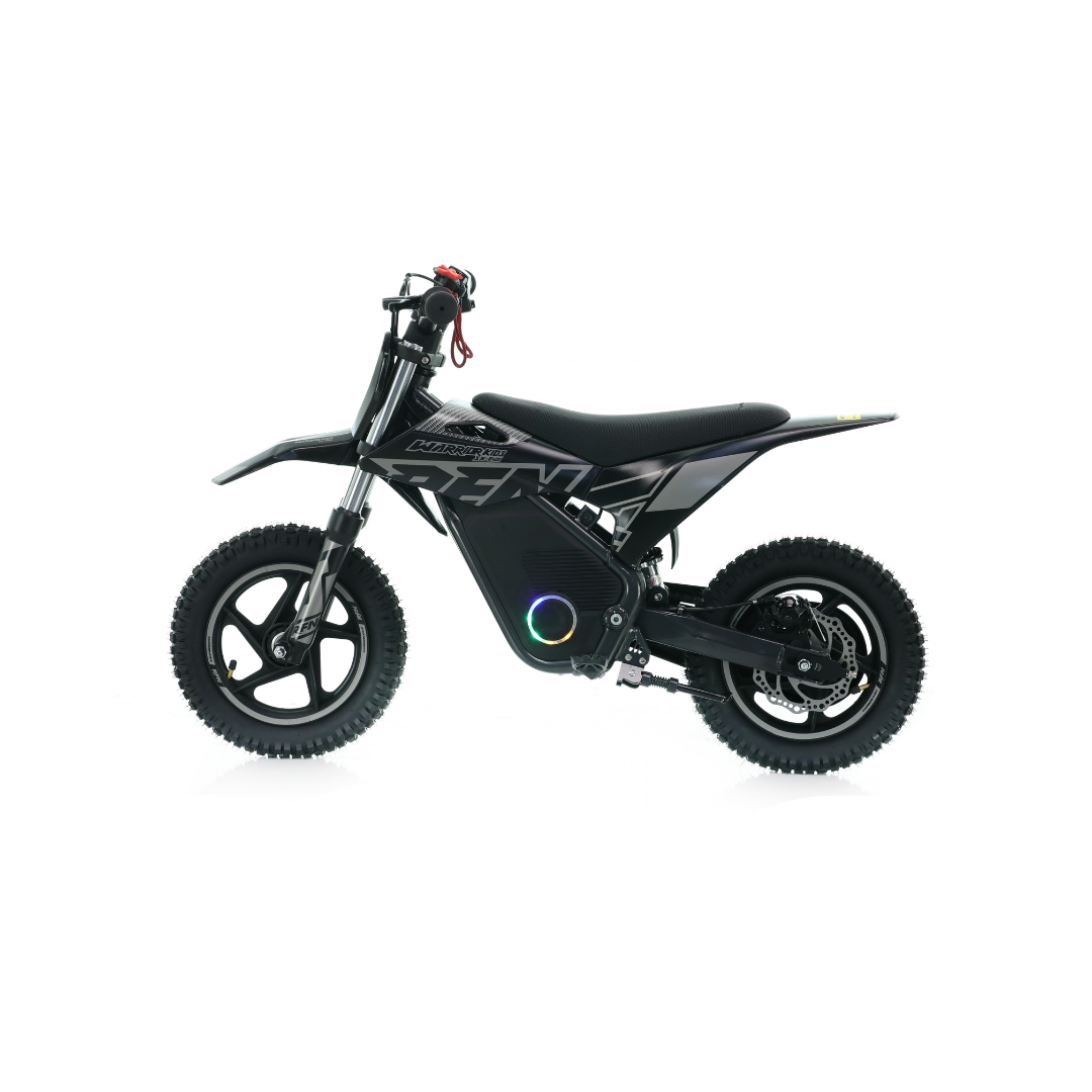 A black electric mini dirt bike with knobby tires, a black seat, and a visible battery pack on the side, photographed from the left against a plain white background.